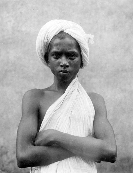 Boy dressed in white, India, ca. 1914