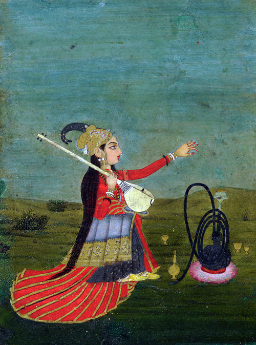Night scene a woman seated on the grass holding a vina